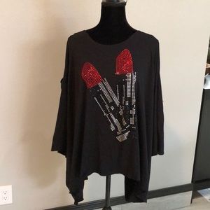 Cold shoulder, dolman sleeve, cape-like pullover